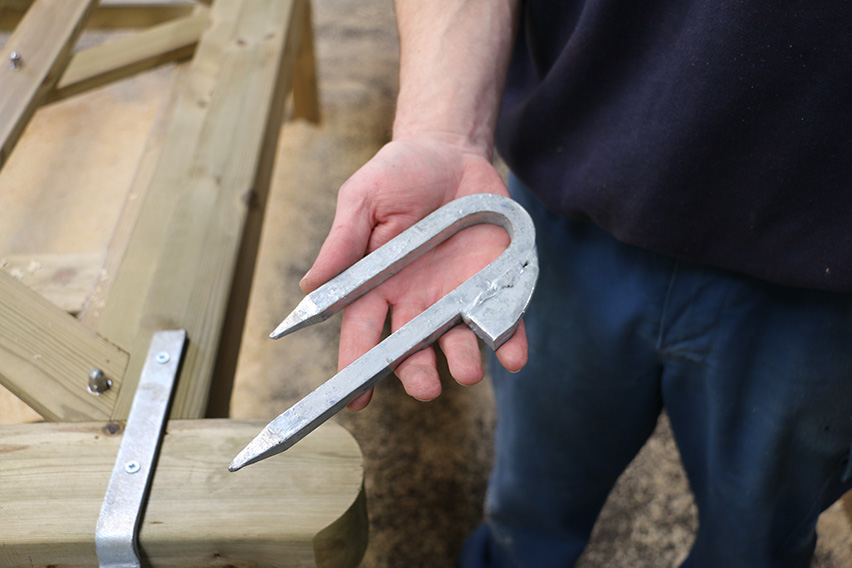 his heavy-duty hook is sent with the gate fastener. It is knocked into the  fence post and provides the fastening mechanism for the spring fastener handle.